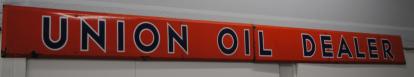 Original Union Oil Dealer Stop Wear Lubrication, shaped metal. Porceline. Orange/blue letters. 20ft x 18inches. $2000 